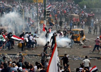 ارتفاع قتلى احتجاجات العراق وحظر للتجول في بغداد