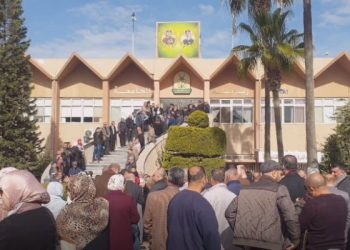 عاملو جامعة اليرموك يحتجون على تخفيض مخصصاتهم