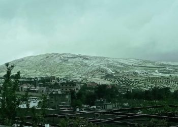 هطولات مطرية غزيرة في السلط وتساقط للبرد في الطفيلة